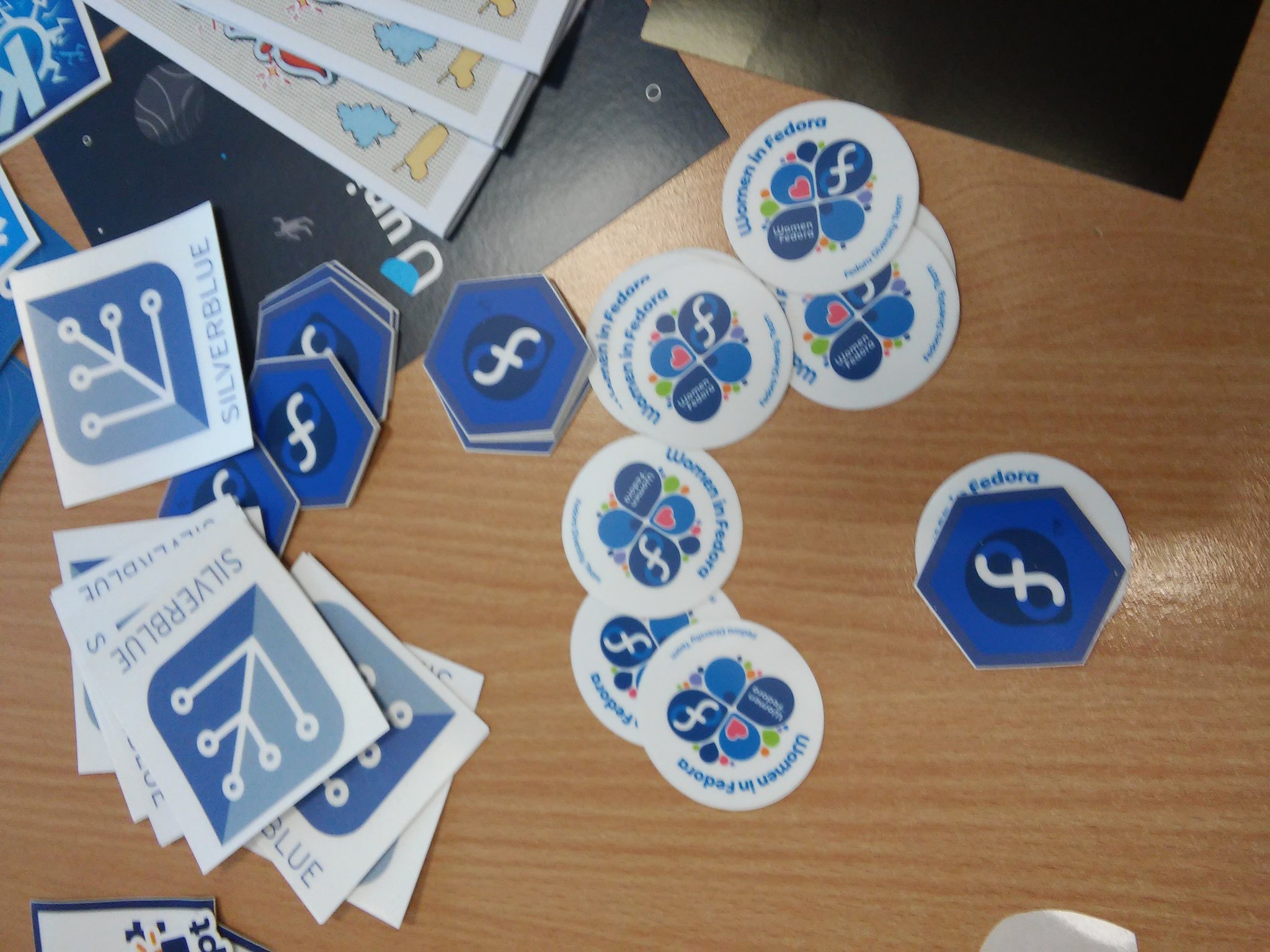 Picture of Fedora stickers on a table